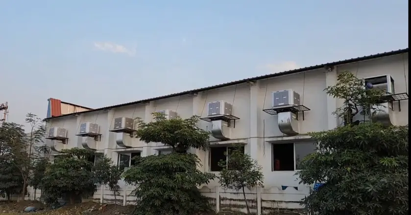 Row of wall coolers on a long building